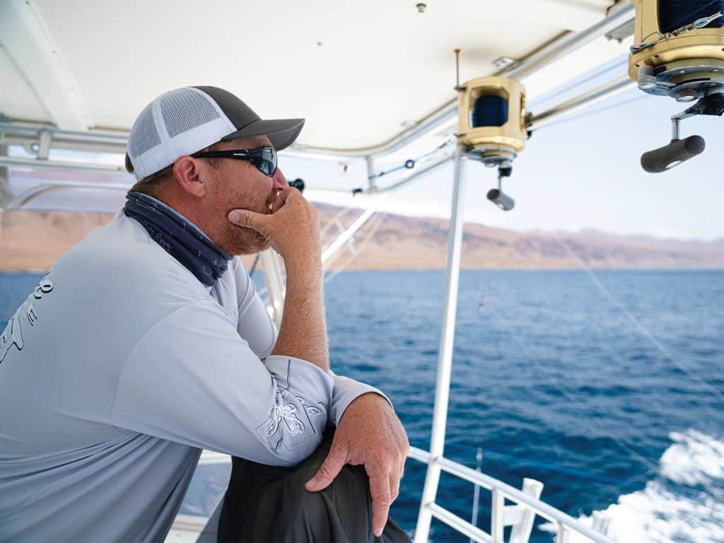 Capt. Marty Bates looking over the waters.
