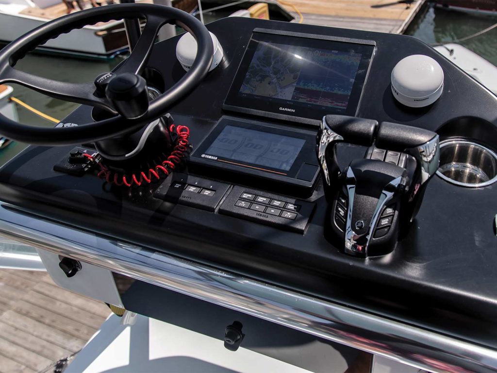 The tower helm and electronics of the Contender 44ST, C1 sport-fishing boat