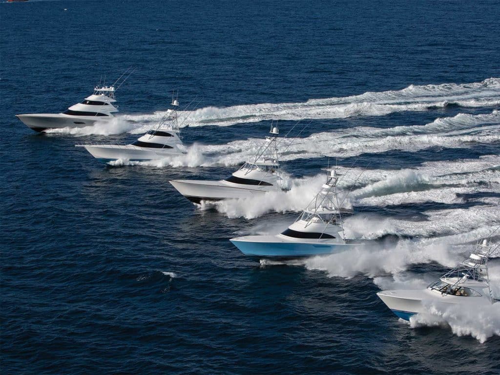 A fleet of sport-fishing boats on the water.