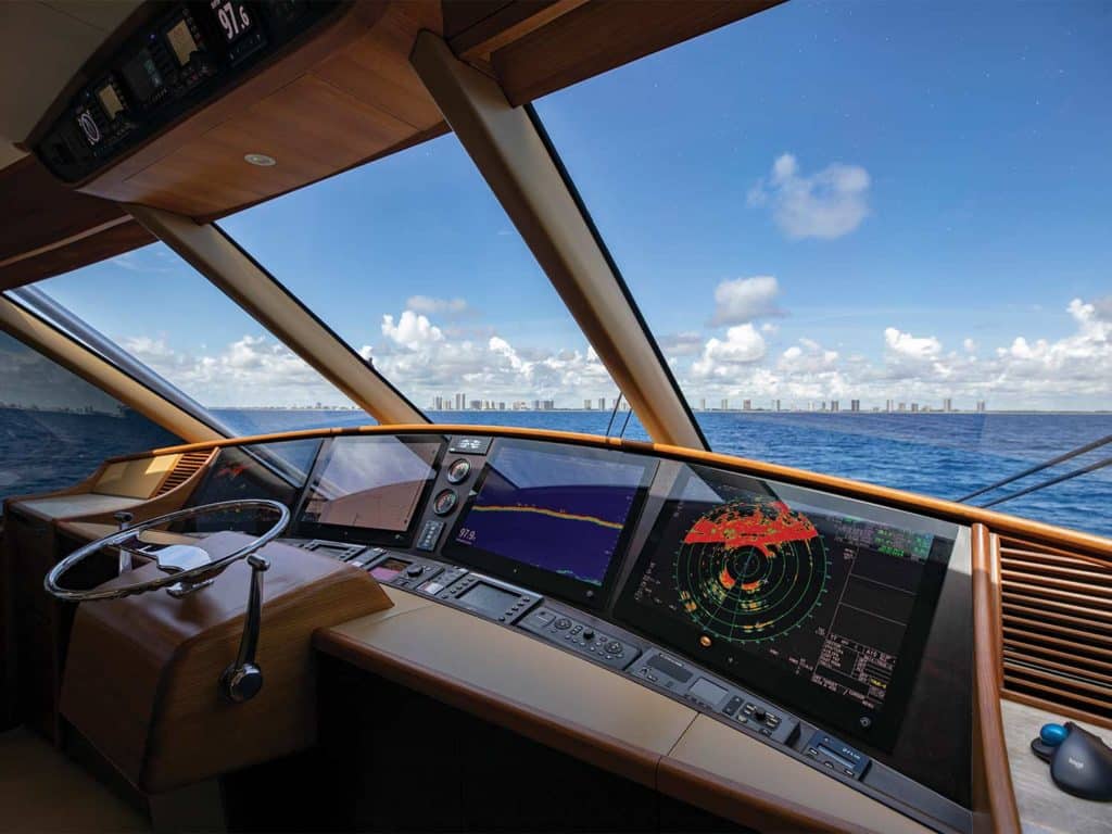 The enclosed helm of a Michael Rybovich & Sons sport-fishing boat.