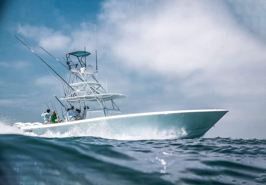 An outboard boat on the water.