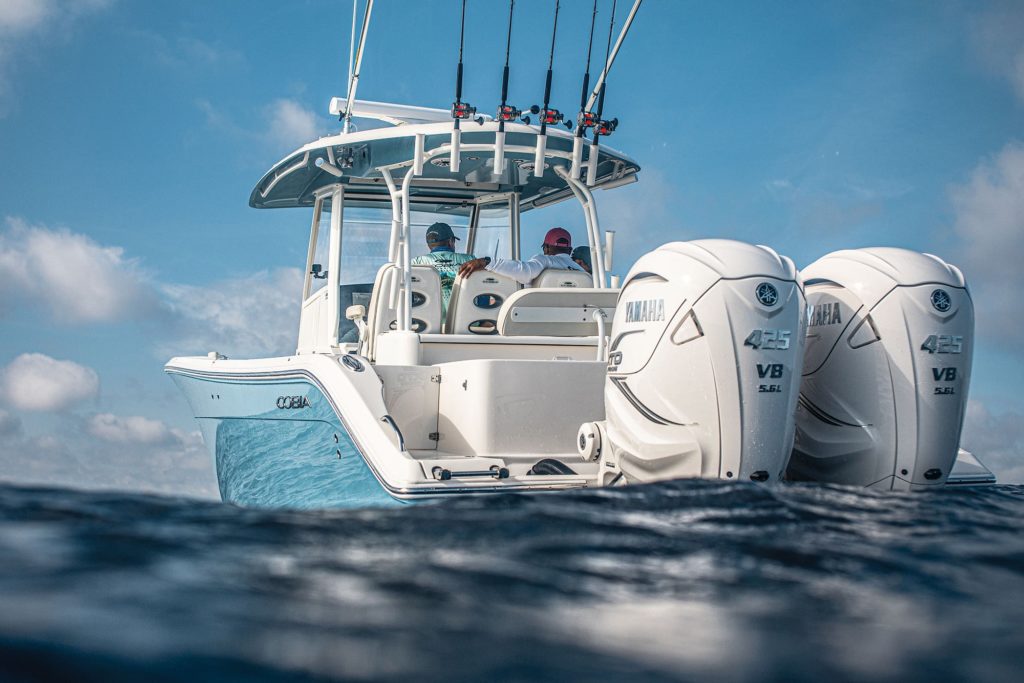 An outboard boat on the water.