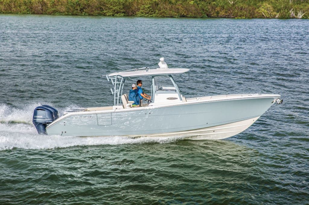 Cobia Boats 320 CC fishing boat on the water.