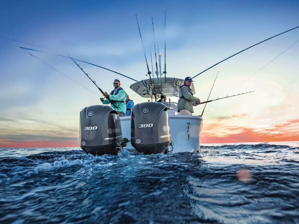 Anglers fishing on a fishing boat equipped with Yamaha outboard motors.