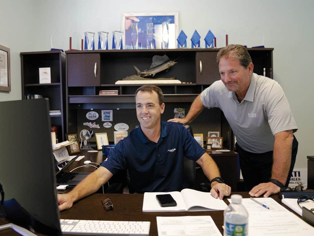 Two men in an office.