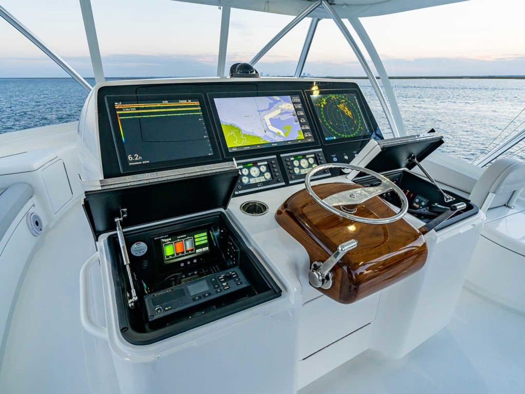 The helm and electronic displays of the Viking Yachts 64 sport-fishing boat.