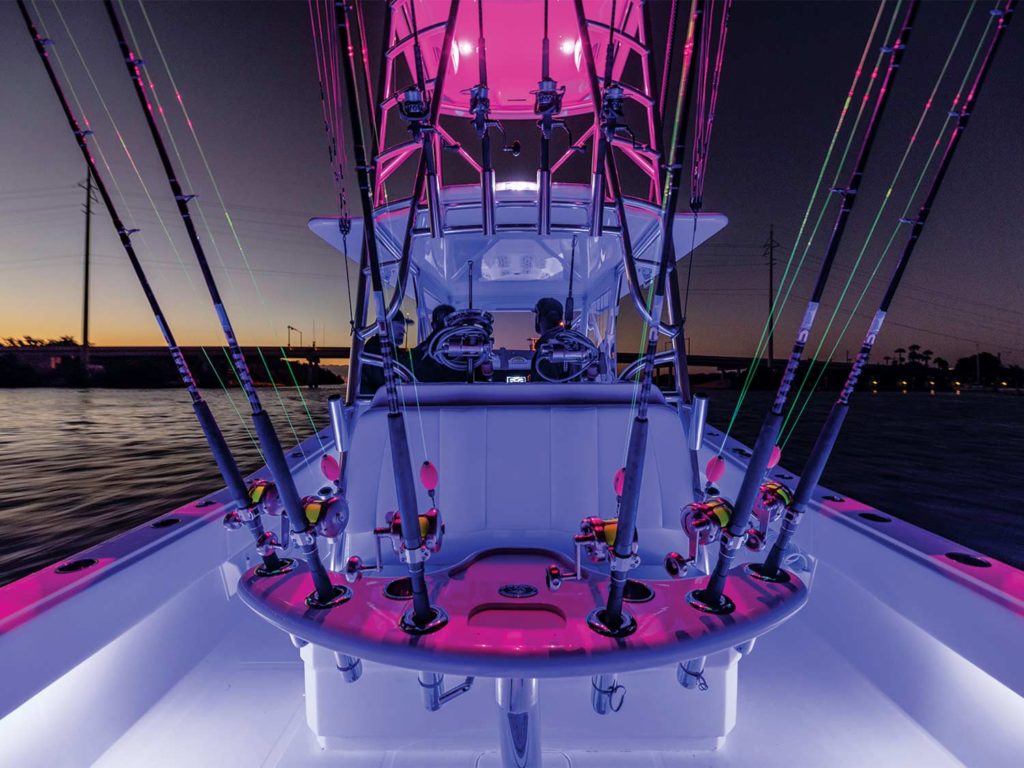 An arrangement of fishing reels in a fighting chair.