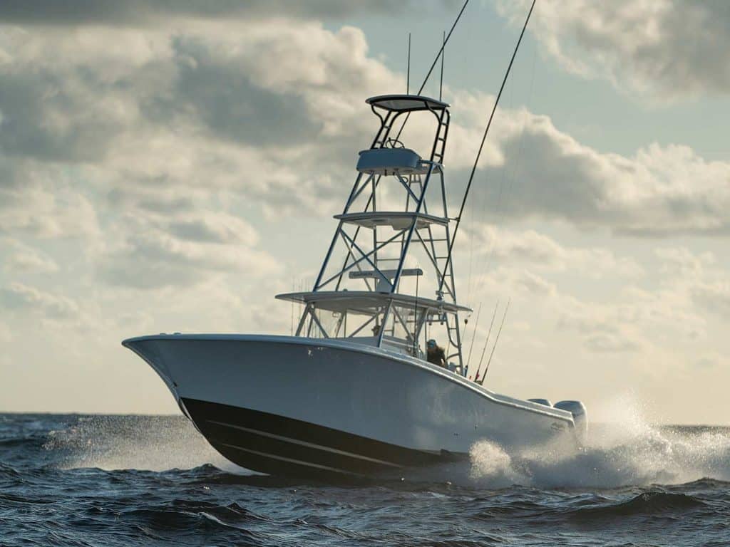 A small sport-fishing boat on the water.