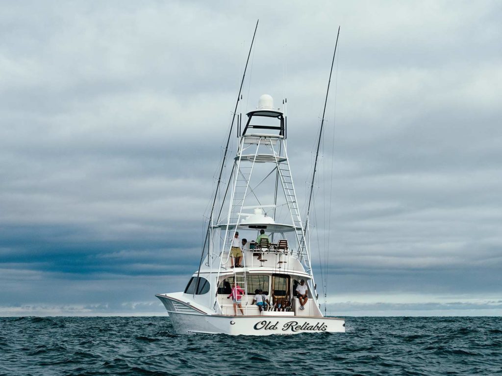 A sport-fishing boat on the water.