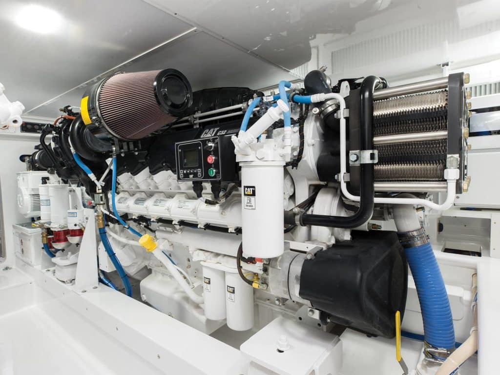 The stark white and clean engine room of the Winter Custom Yachts 63.