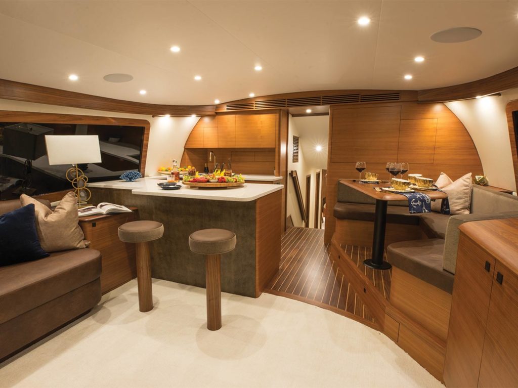 The interior salon and galley of the Winter Custom Yachts 63.