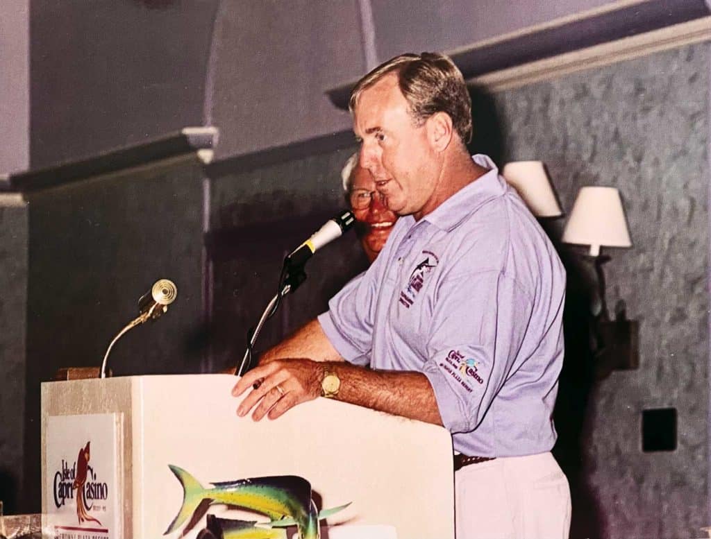 Bobby Carter giving a speech at a tournament event.