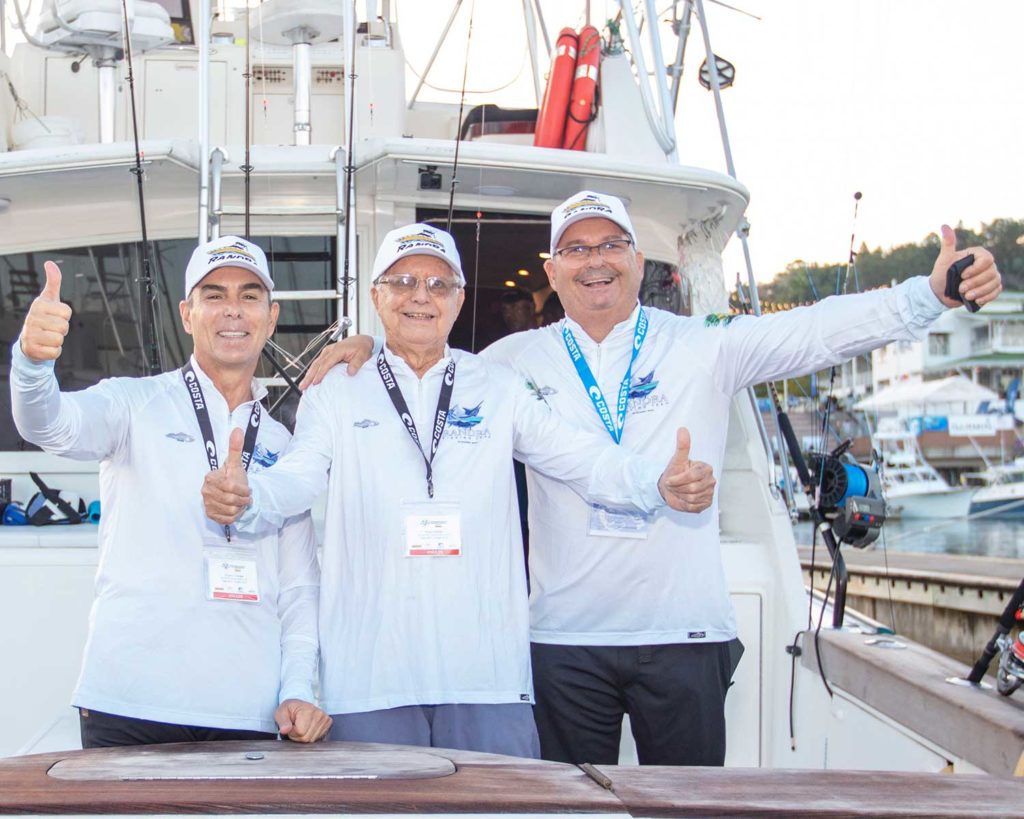 Three sport-fishing anglers at the Offshore World Championship.