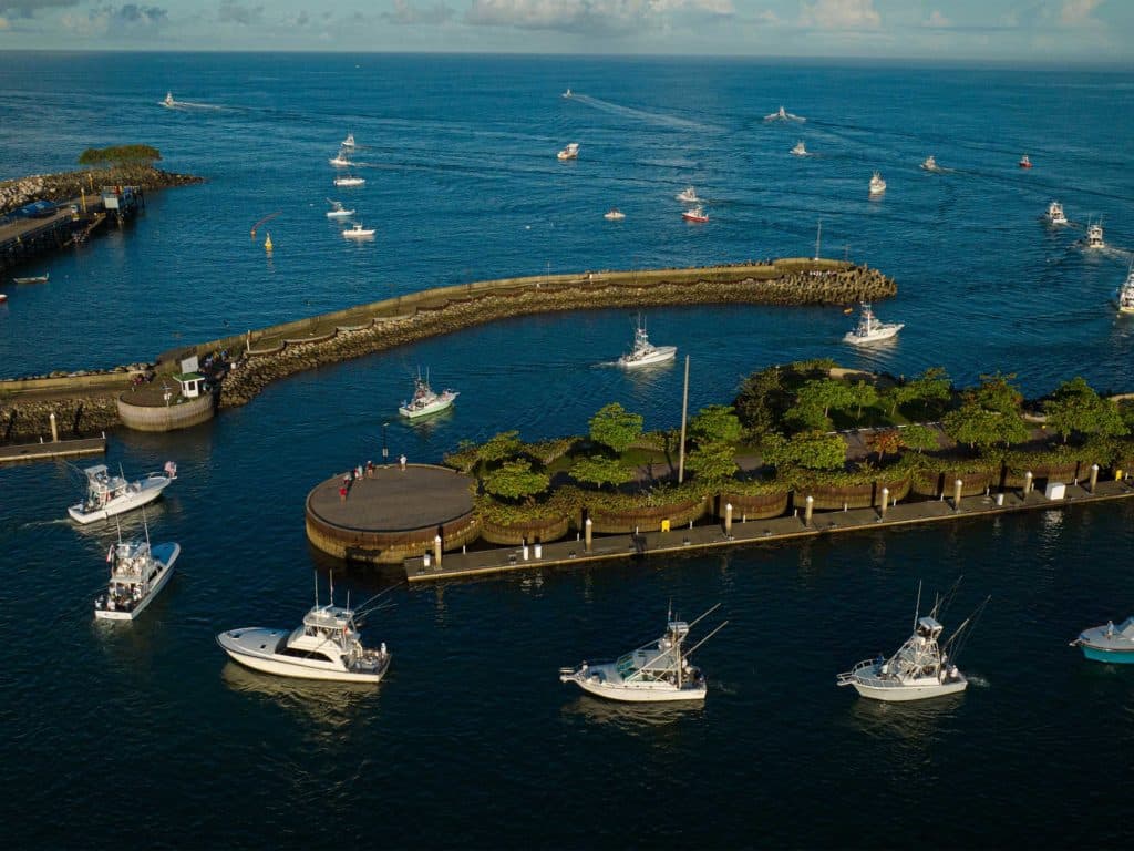 The boats file out of Marina Pez Vela for the first day of fishing.