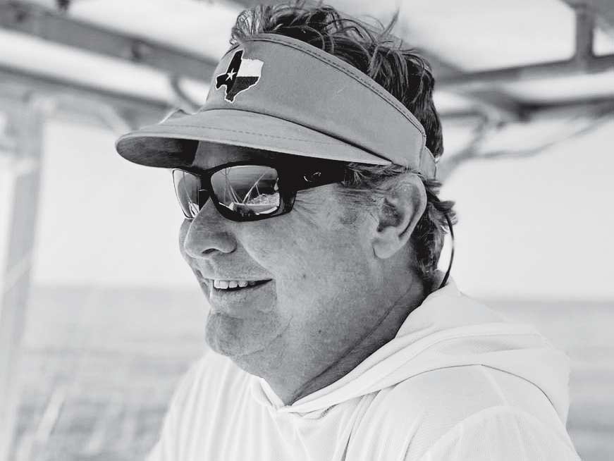 A black and white image of a boat captain.