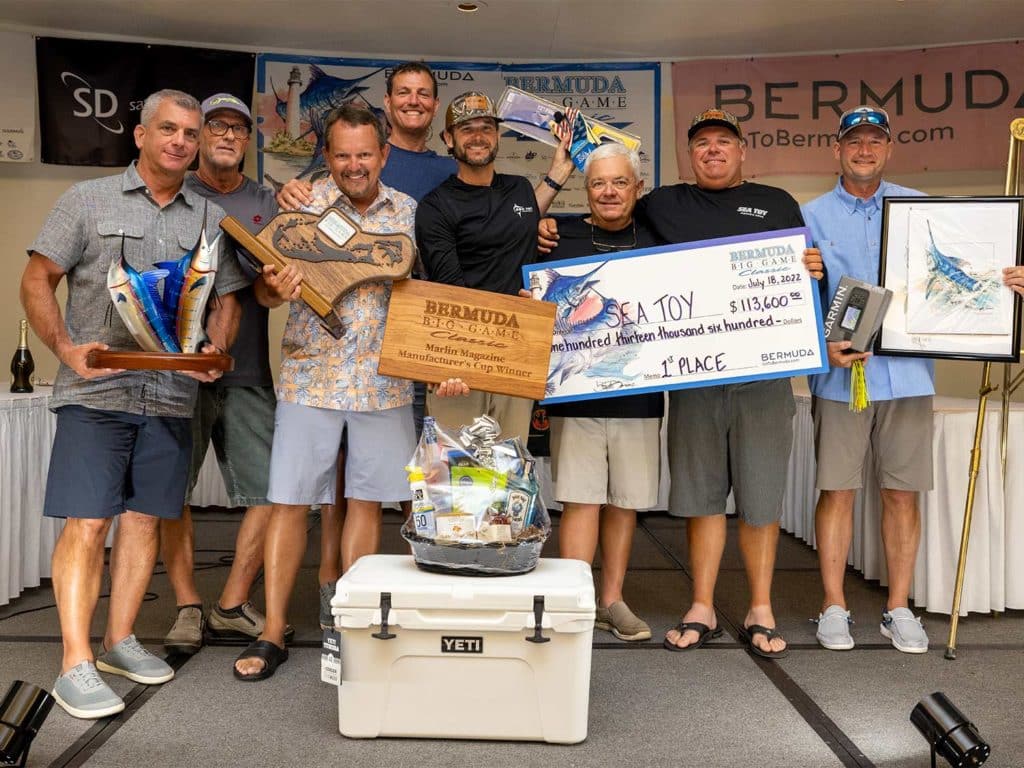 A sport-fishing team stands at the Bermuda Big Game Classic awards ceremony.