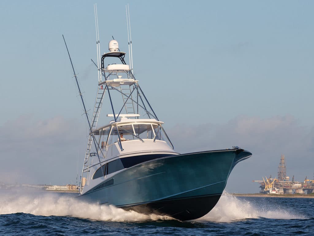 A sport-fishing boat cruising on the water.