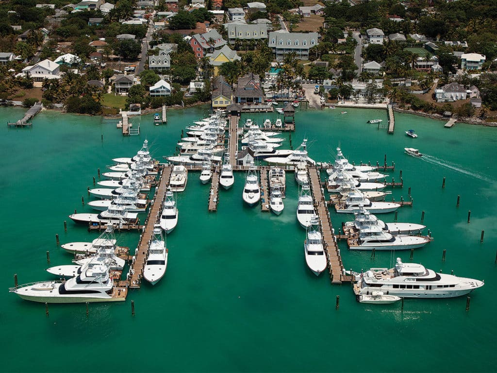 An aerial view of a resort marina with boats docked.