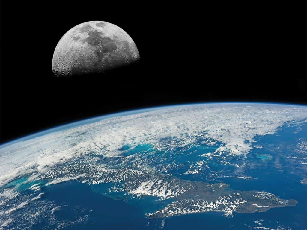 Satellite photo of moon shadowed by the earth in space.