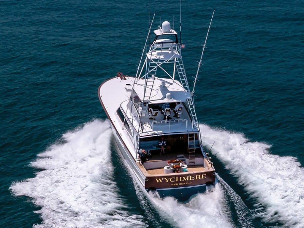 A sportfishing boat cruises across the water.