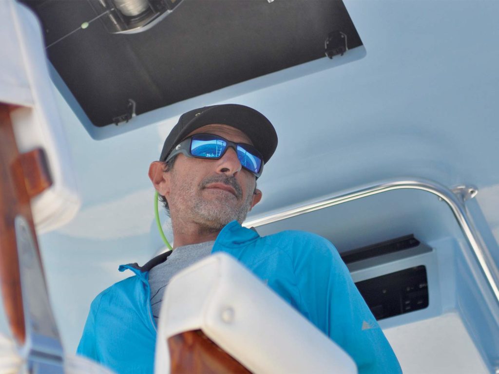 A sport-fishing captain at the helm.