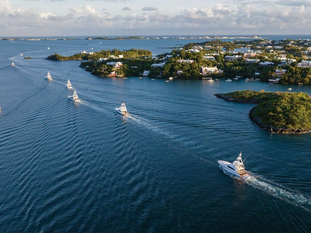 A fleet of sport-fishing boats head out to sea in Bermuda.