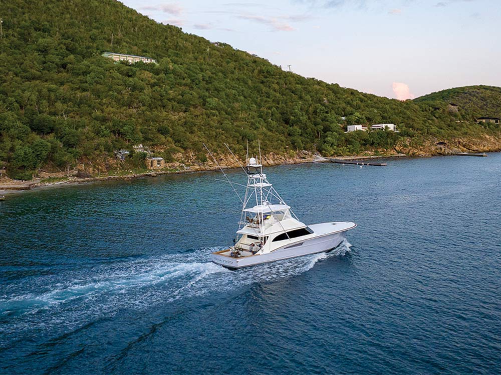 A sport-fishing boat cruising across the waters.