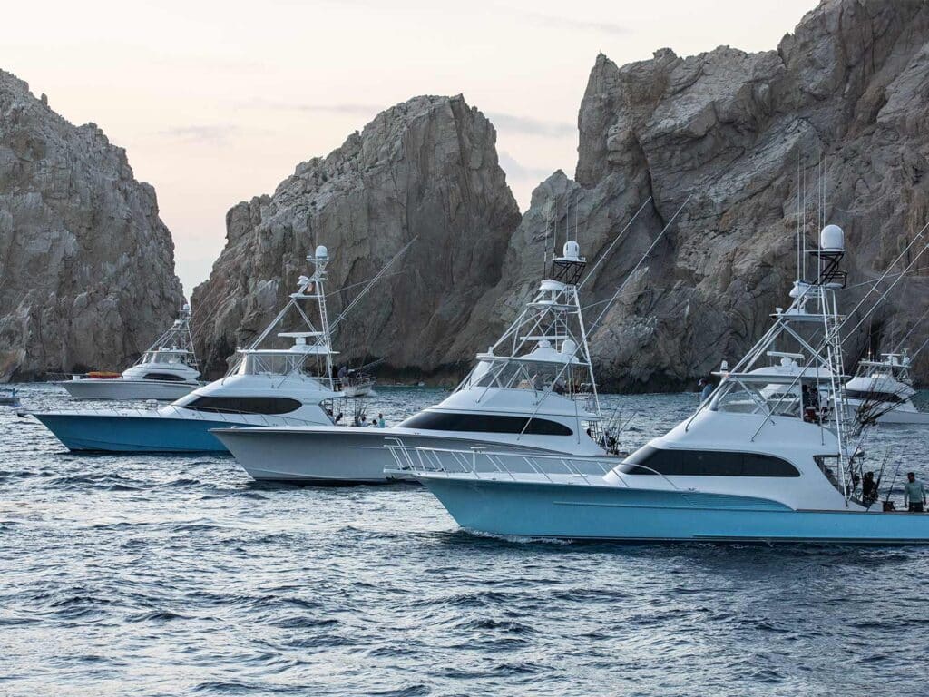 A fleet of sport-fishing boats cruising across the waters at the Los Cabos Billfish Tournament.