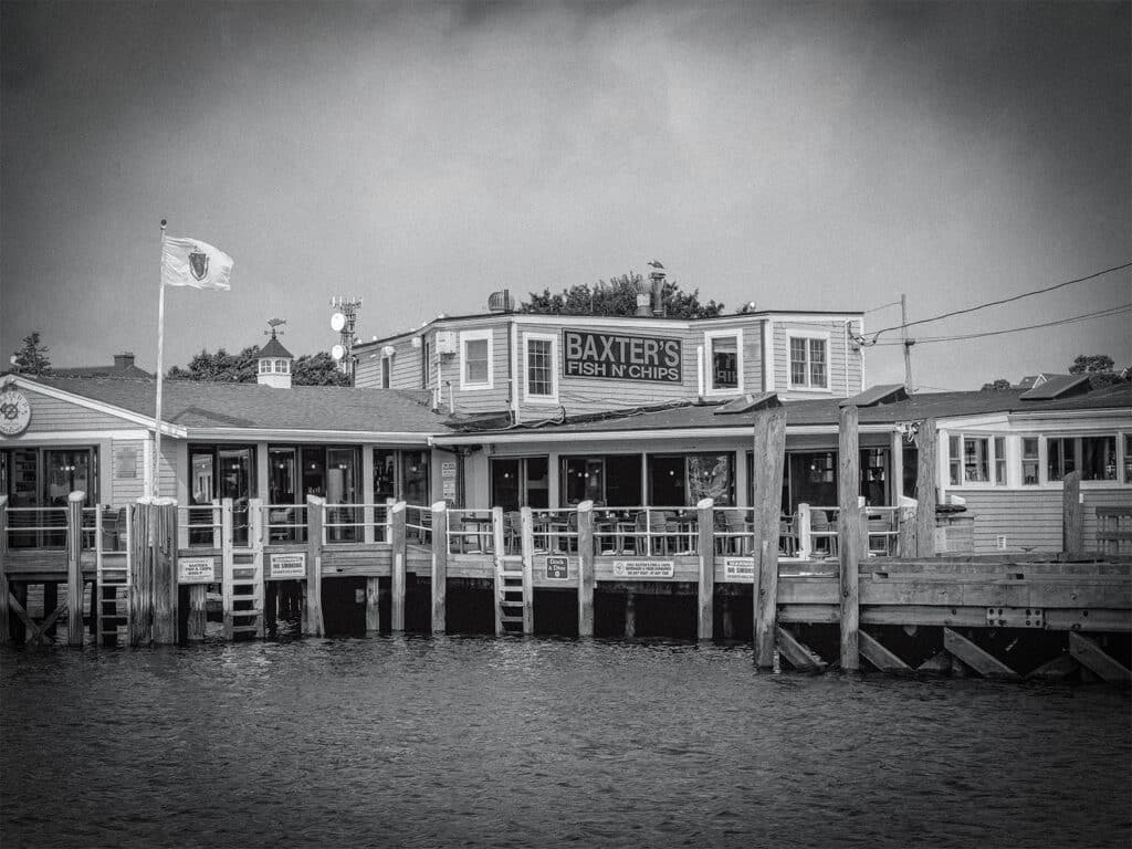 A black and white grainy image of Baxter's Fish and Chips marina restaurant.