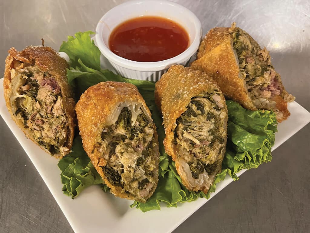 A plate of egg rolls.