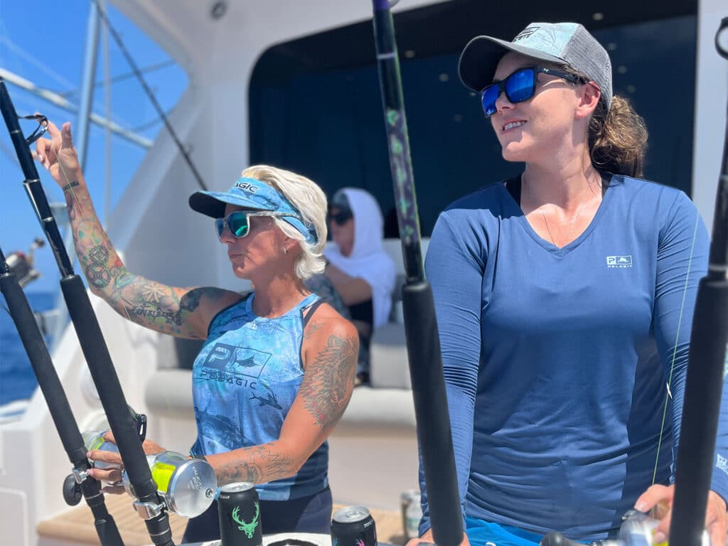 Two women fishing.