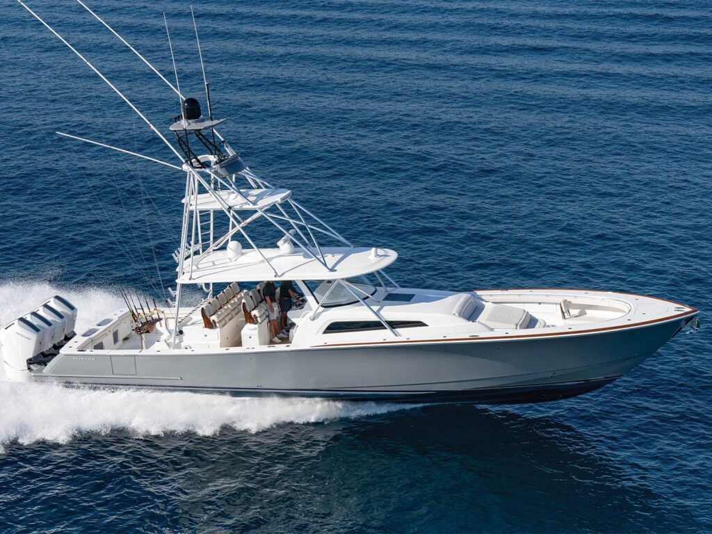 A sport-fishing boat cruises across the open waters.