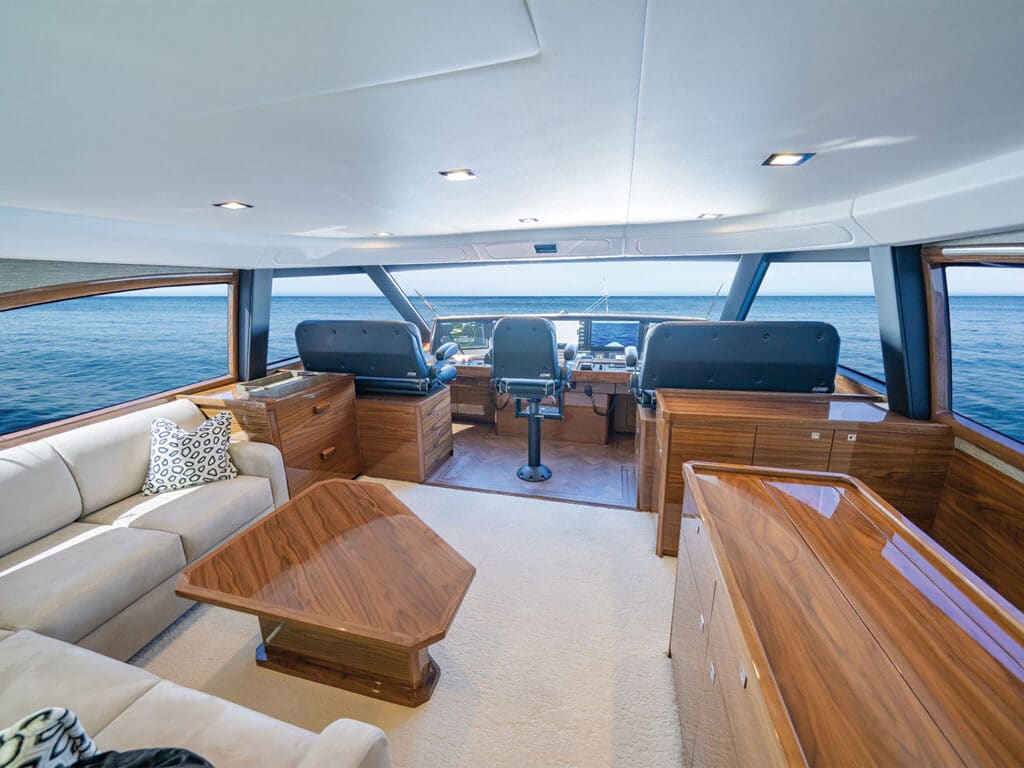 Salon seating behind the helm of the Viking Yacht 90 sport-fishing boat.