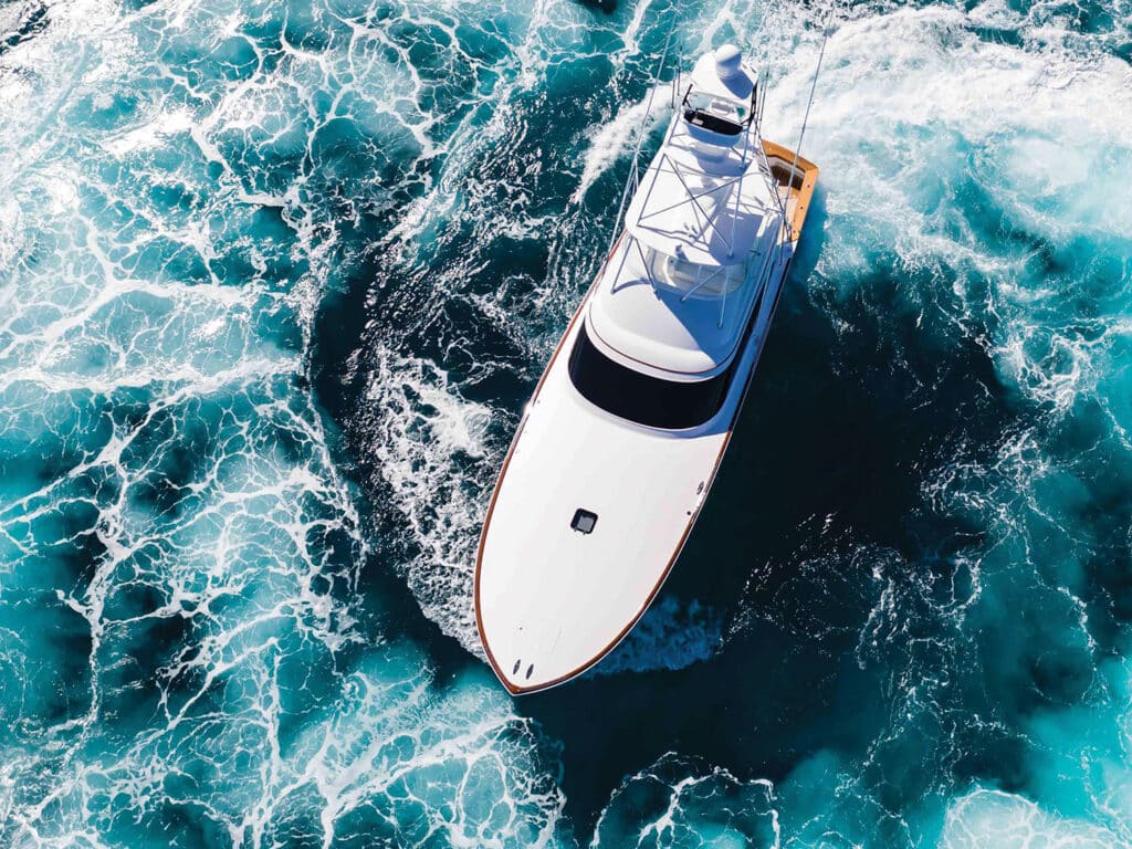 A top-down view of a sport-fishing boat during a 360 rotation maneuverability test.