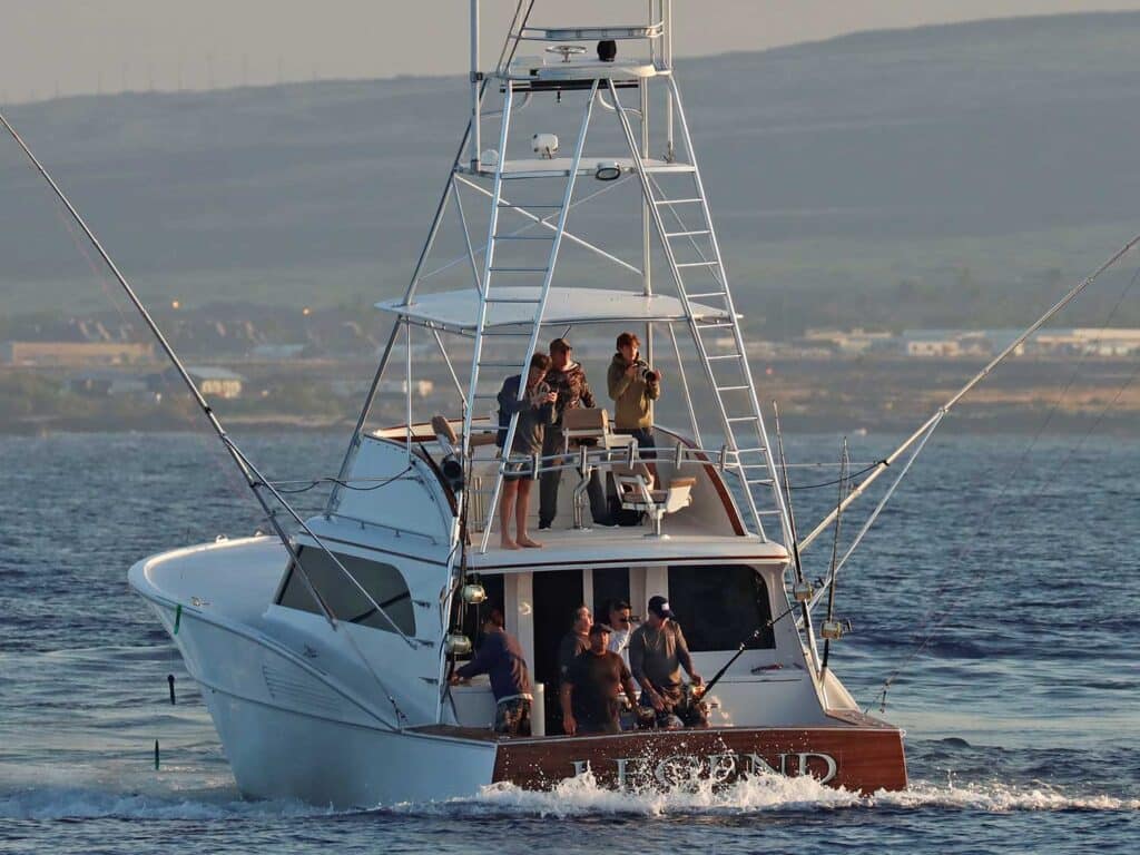 The rear view of a sport-fishing boat crewed with a team of anglers.