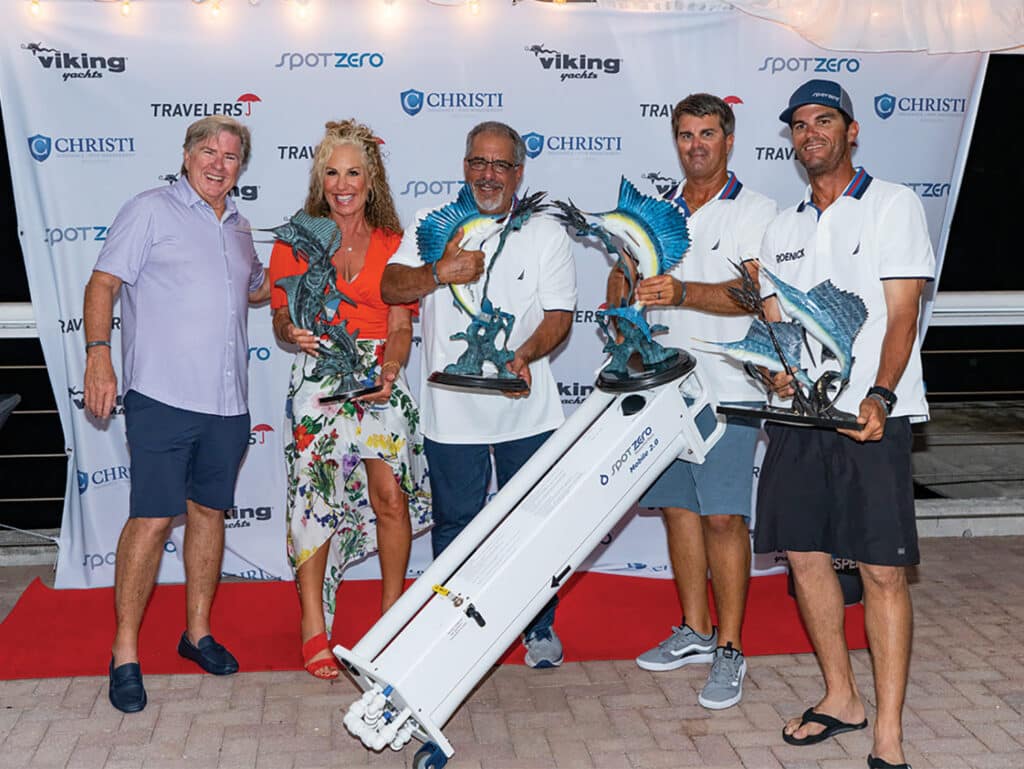 Team Roenick standing at the awards ceremony of the Viking Key West Challenge.