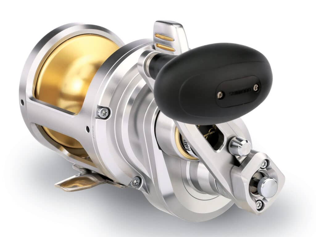 Shimano Talica II sport-fishing reel isolated on white background.