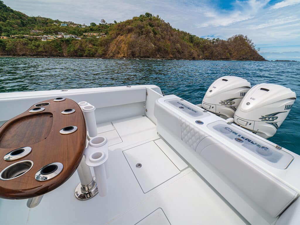 A view of the cockpit and the ocean from a sport-fishing boat.