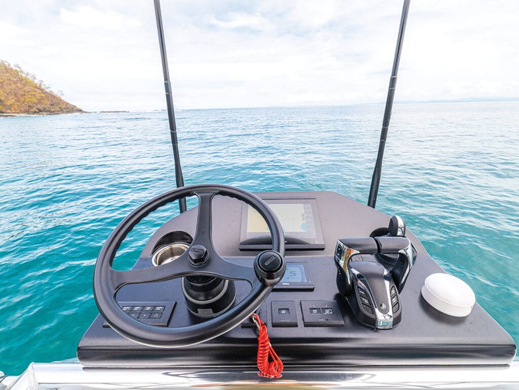 A view from the tower of a sport-fishing boat overlooking the ocean.