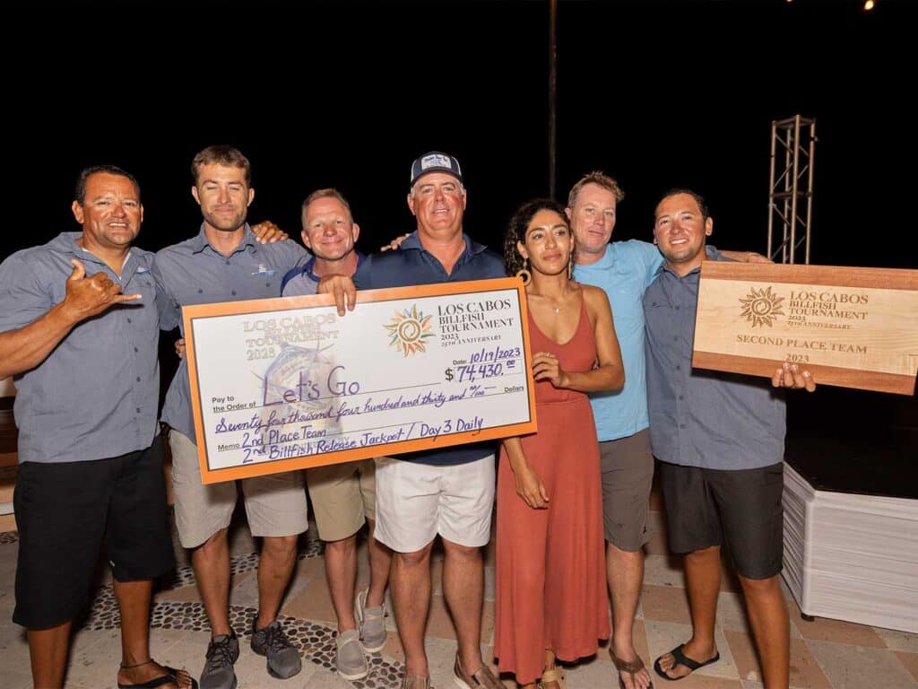 Team Let's Go celebrating at the 2023 Los Cabos Billfish Tournament awards ceremony.