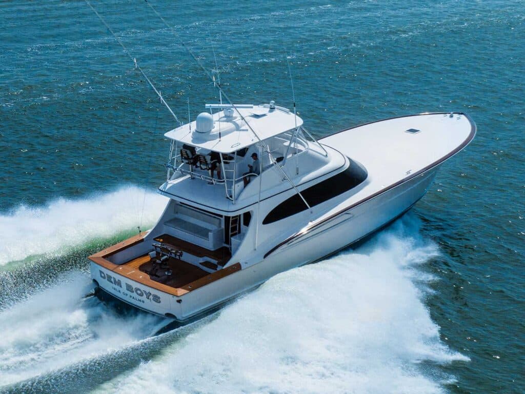 A Duffie Boatworks 70 sport-fishing boat cruising across the open ocean.