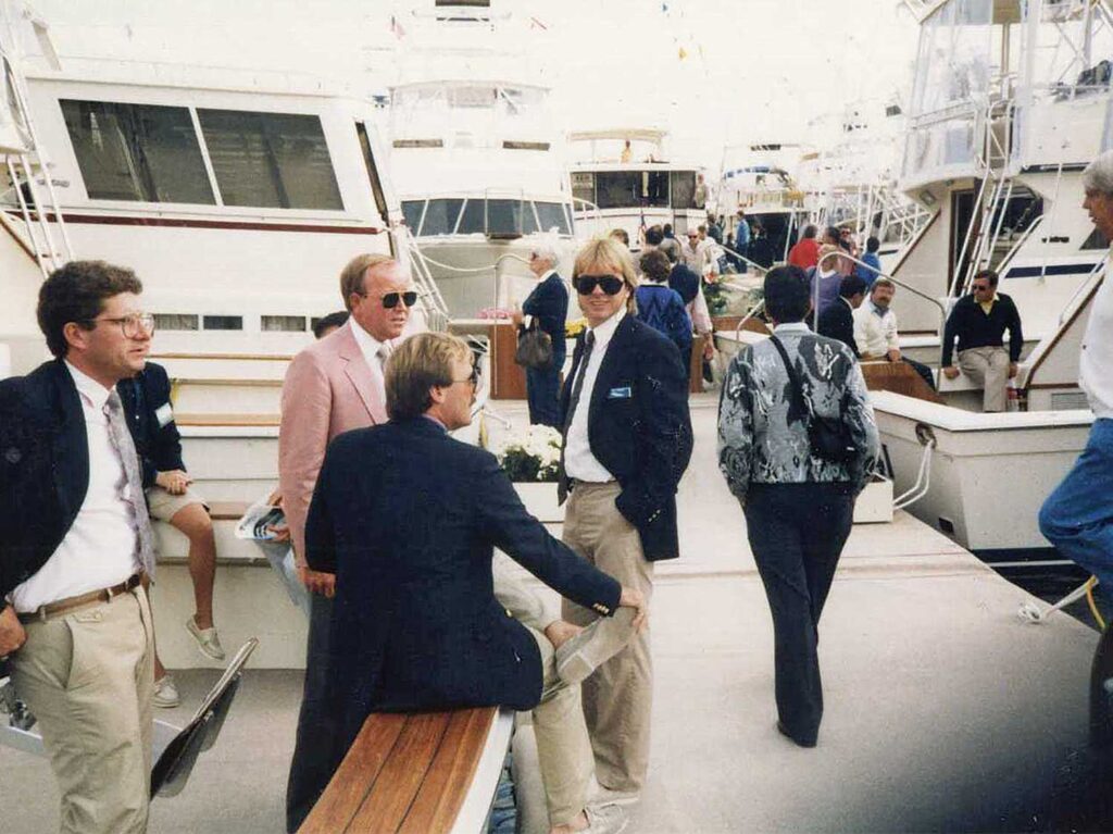 Young Pat Healey on the docks of a sport-fishing boat show event.