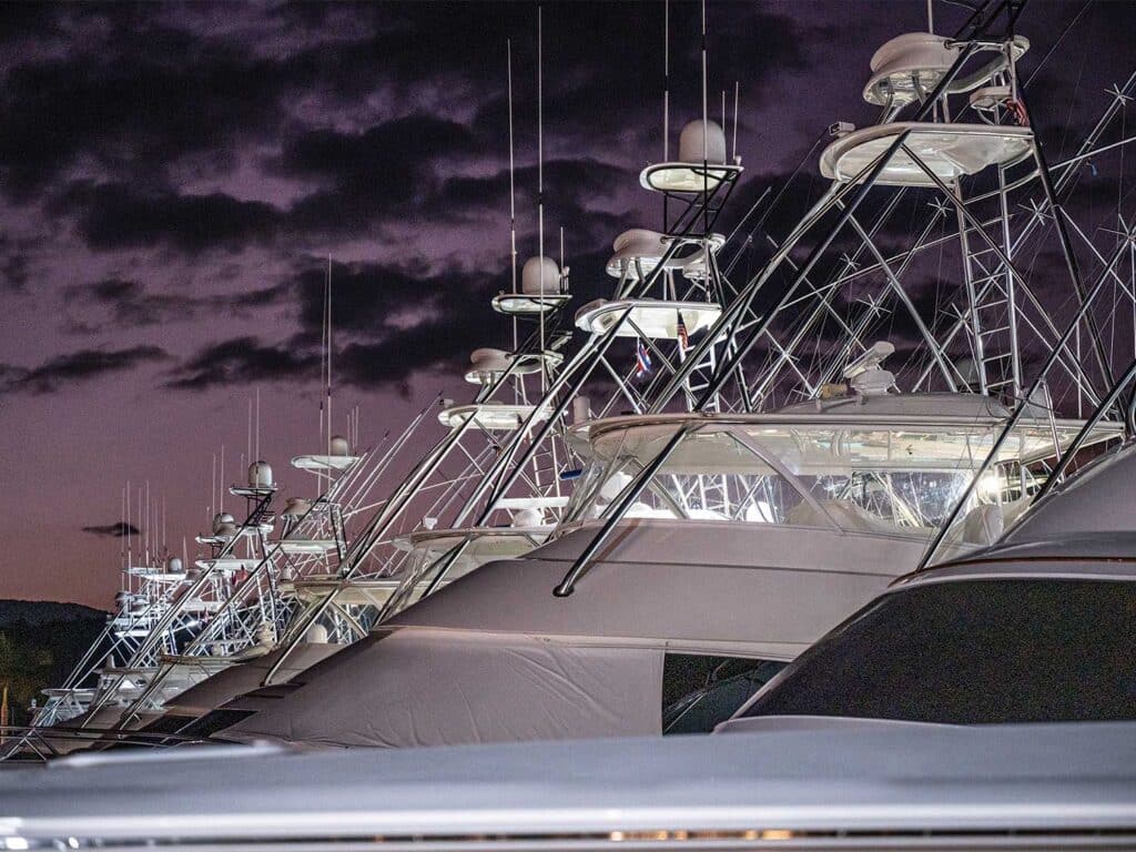 A lineup of sport-fishing boat featuring their tuna towers.