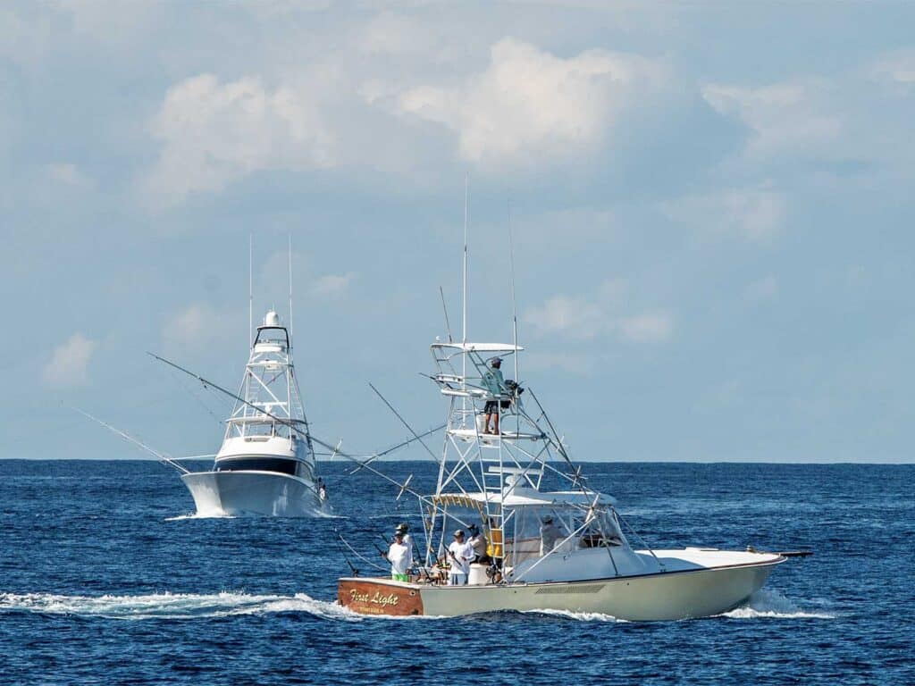 Two sport-fishing boats on the open ocean.