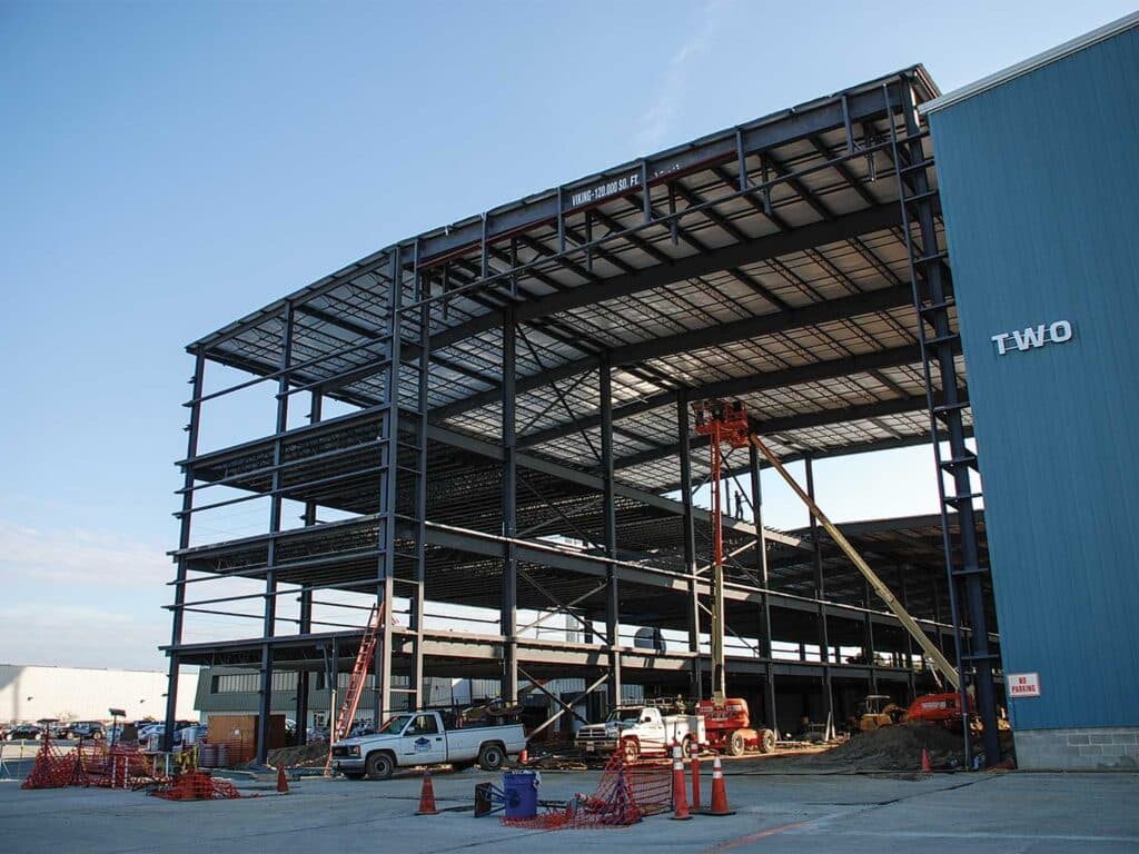 A photo of Viking Yacht Company's boat-building facility undergoing updates.