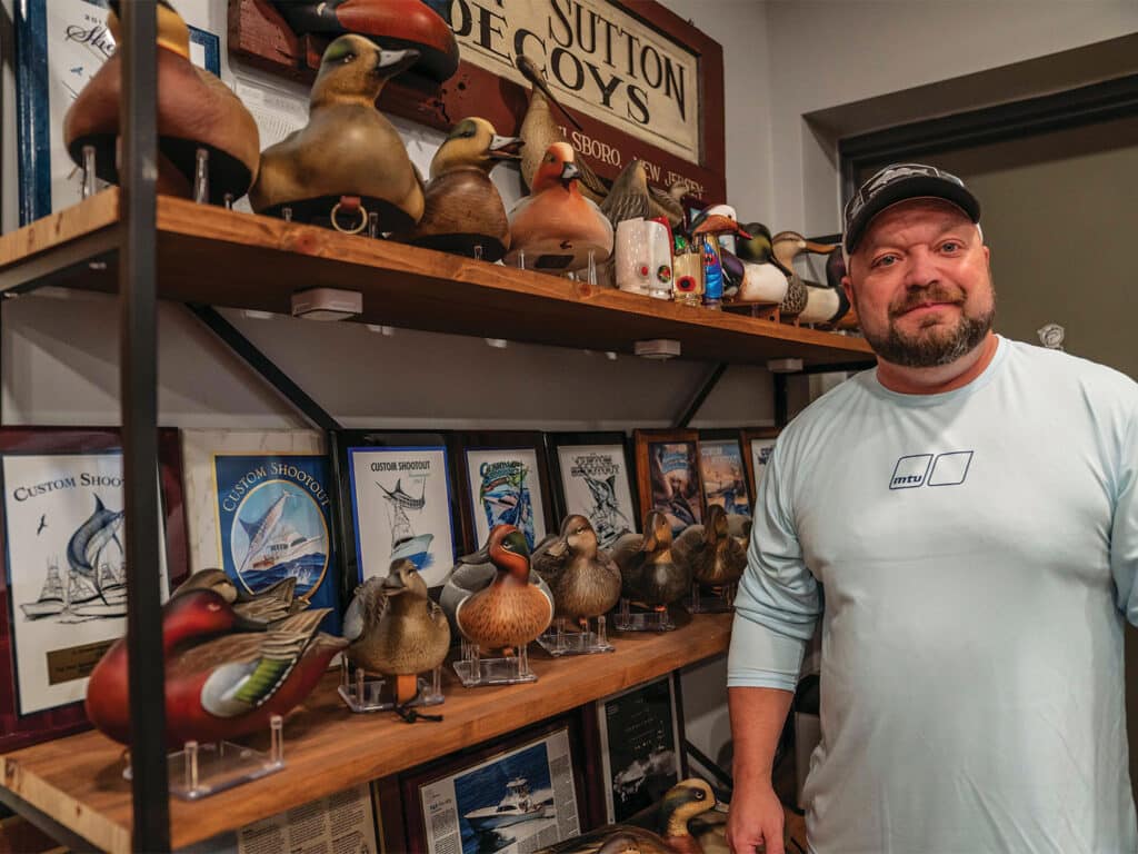 John Floyd shows off his waterfowl decoys.