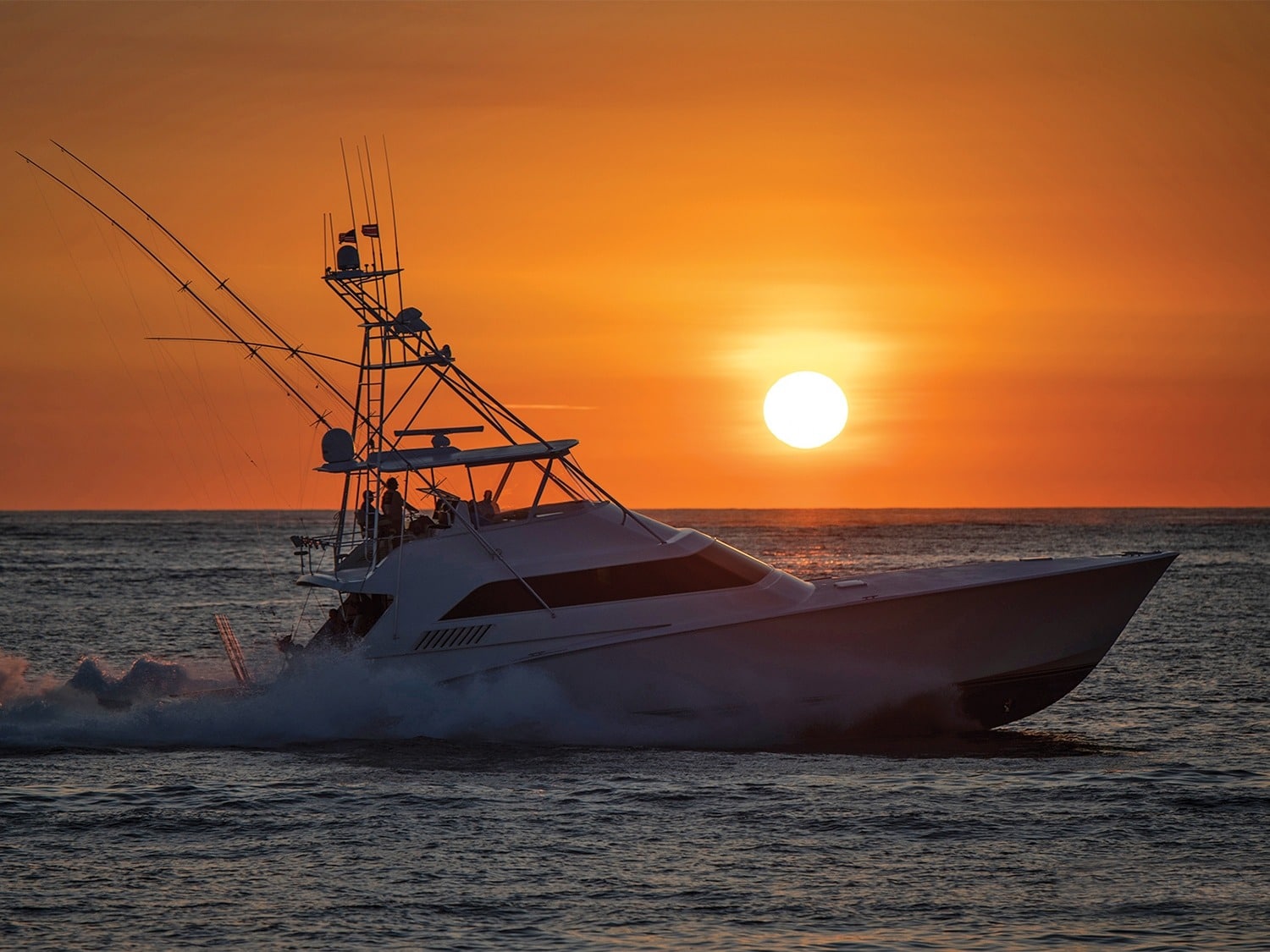 https://www.marlinmag.com/wp-content/uploads/2024/02/sport-fishing-boat-cruising-suns.jpg