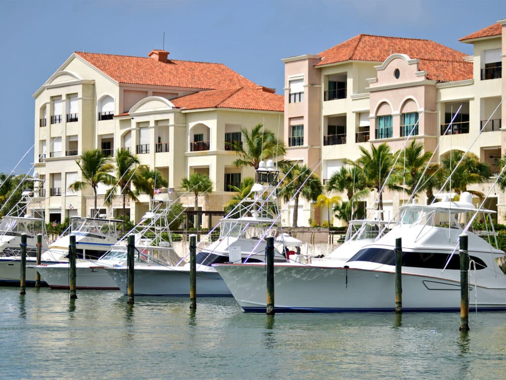 A row of sport-fishing boats docked at Marina Cap Cana's dock.