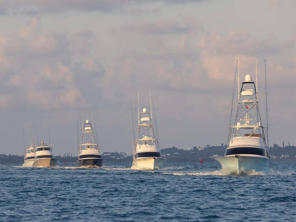 A fleet of sport-fishing boats on the water.