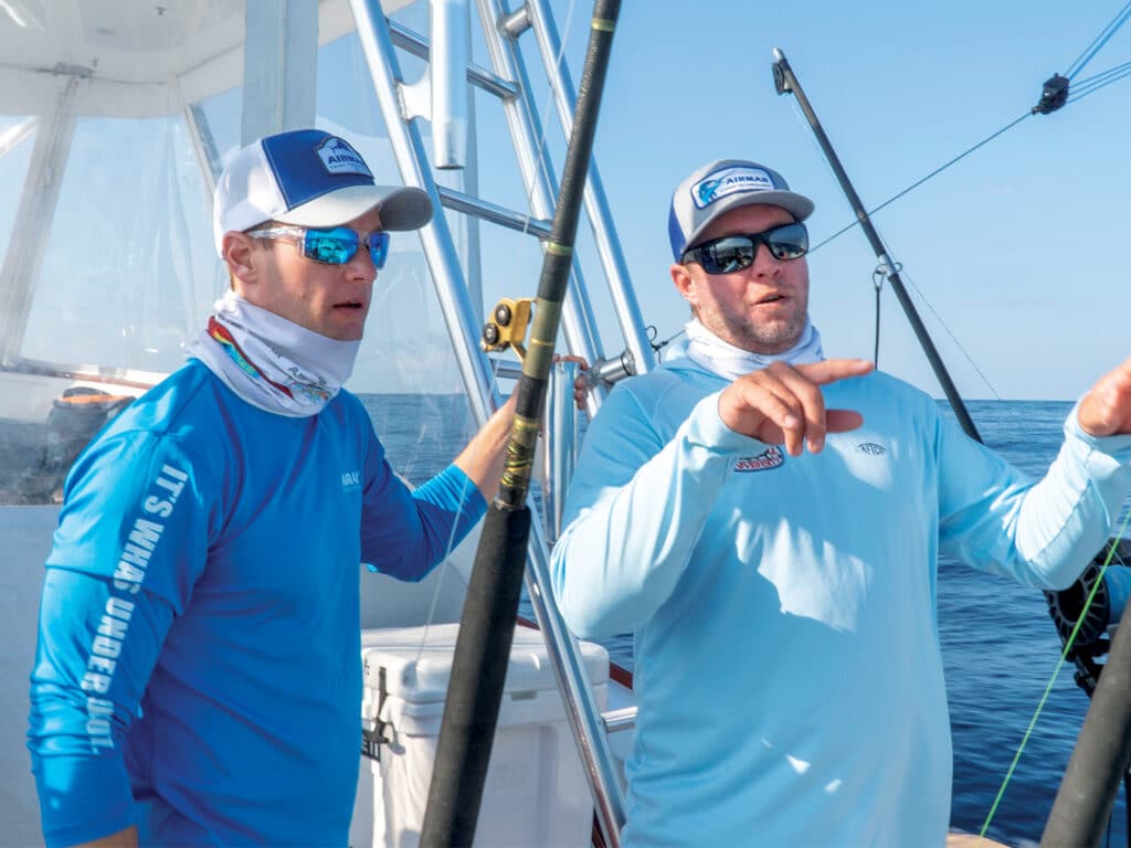 Capt. Brad Goodrich demonstrating to an onlooking Expeditions attendee.